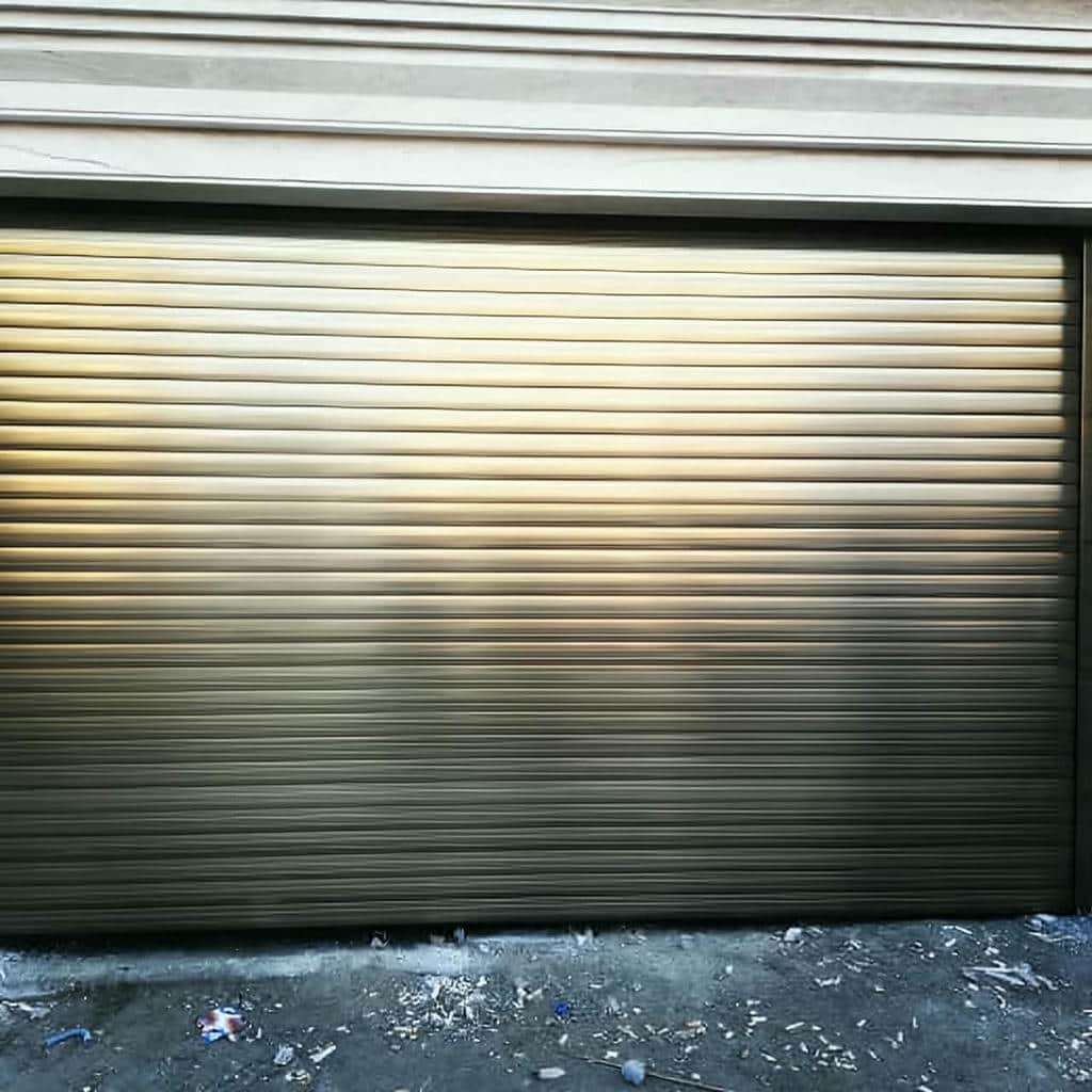 نصب کرکره برقی پارکینگ در کمال شهر