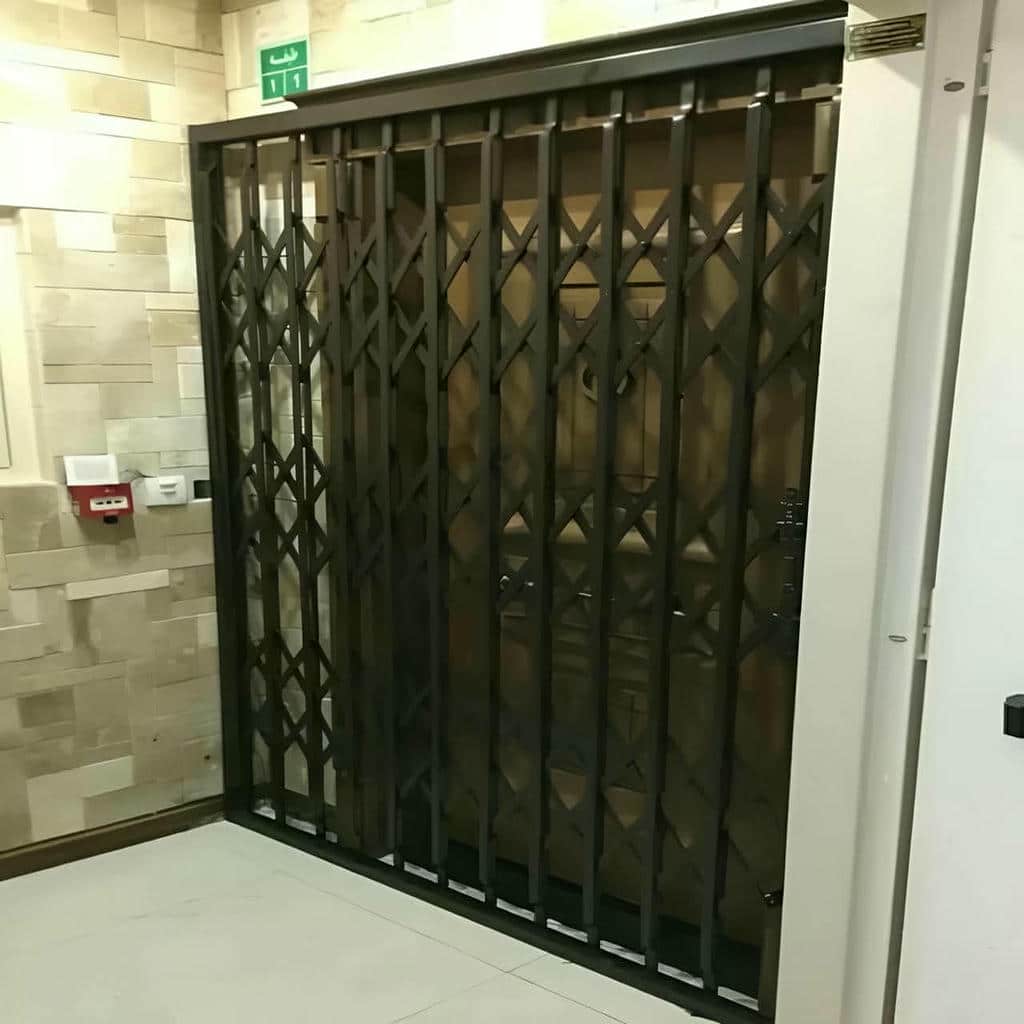 خرید درب حفاظ آکاردئونی دوگل در هشتگرد