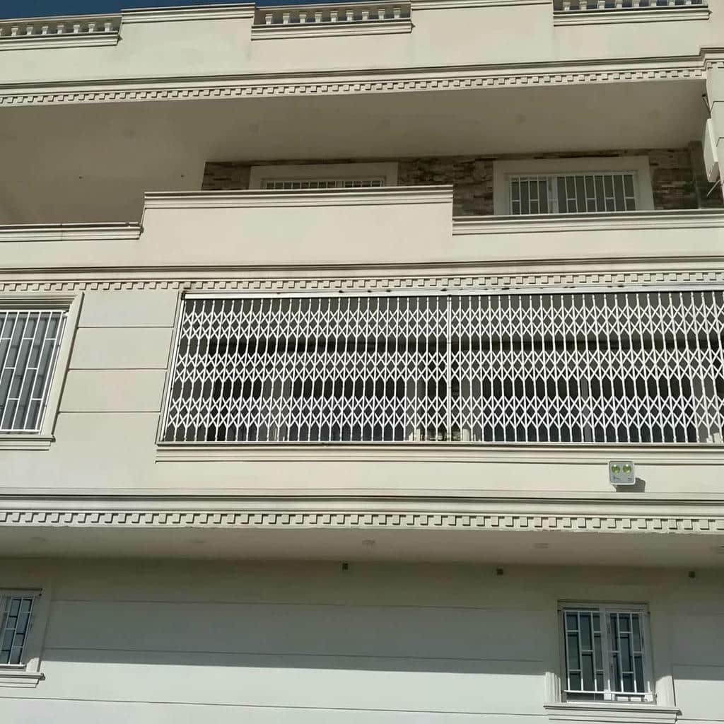 کارخانه درب حفاظ آکاردئونی با قفل ضدبرش در پرند