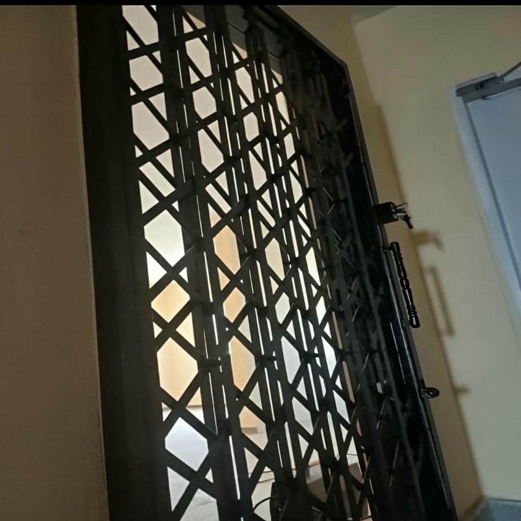 قیمت درب حفاظ آکاردئونی سه گل در قائمشهر