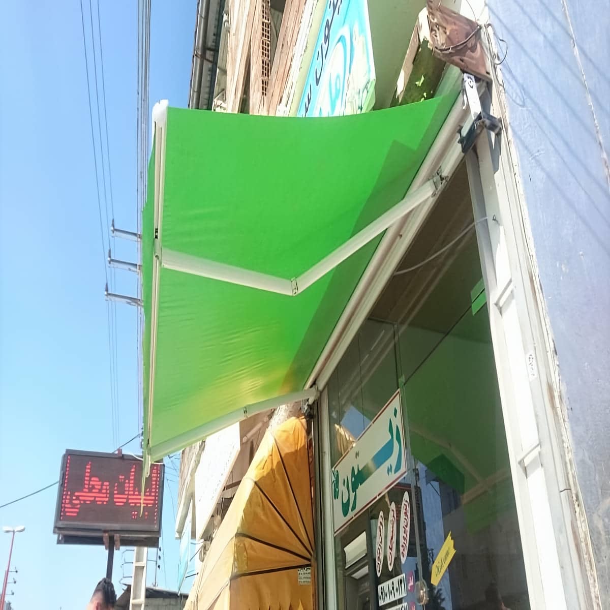 سایبان برقی تراس و بالکن با زیرسازی مقاوم دیوار