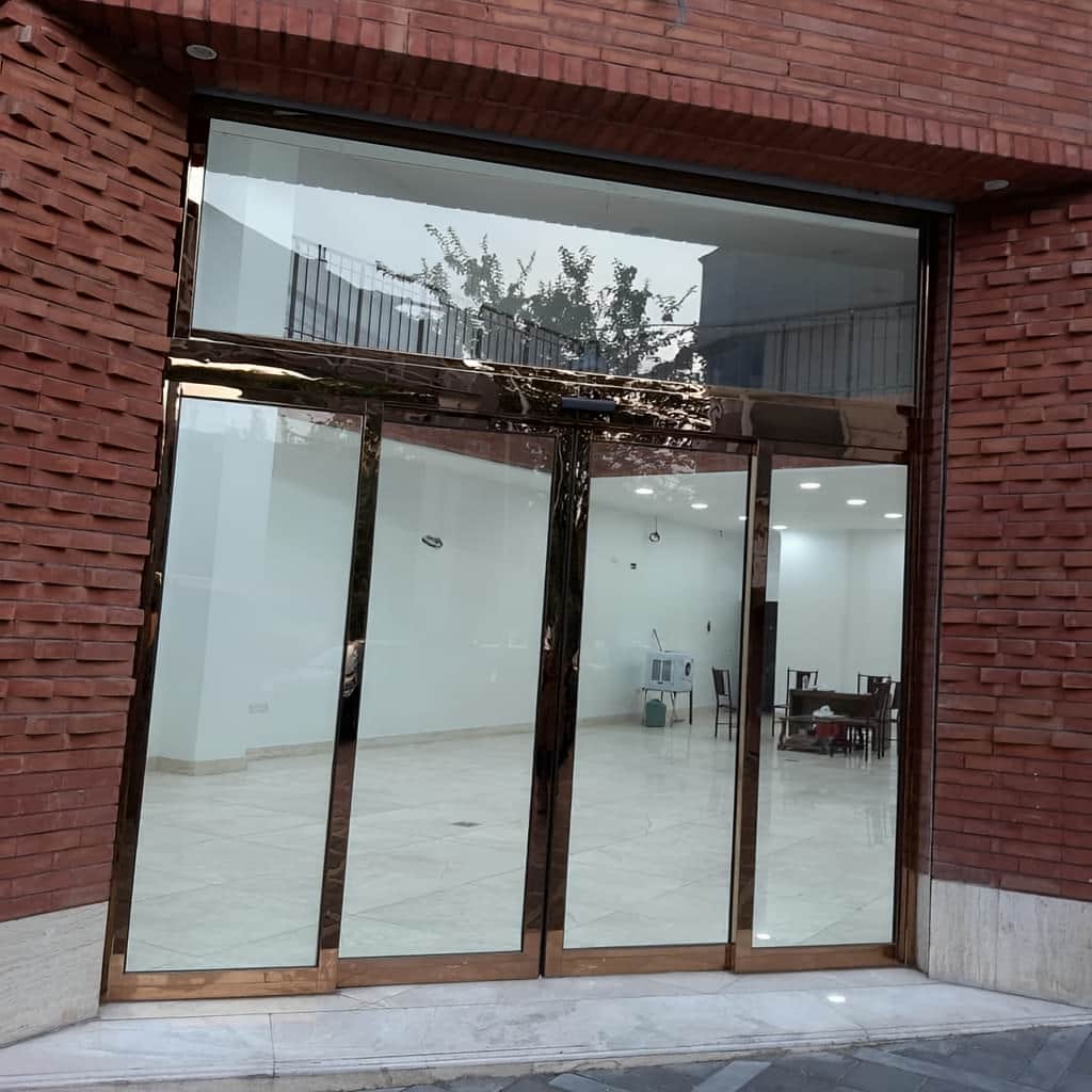 قیمت درب شیشه ای کشویی با اپراتور باکیفیت