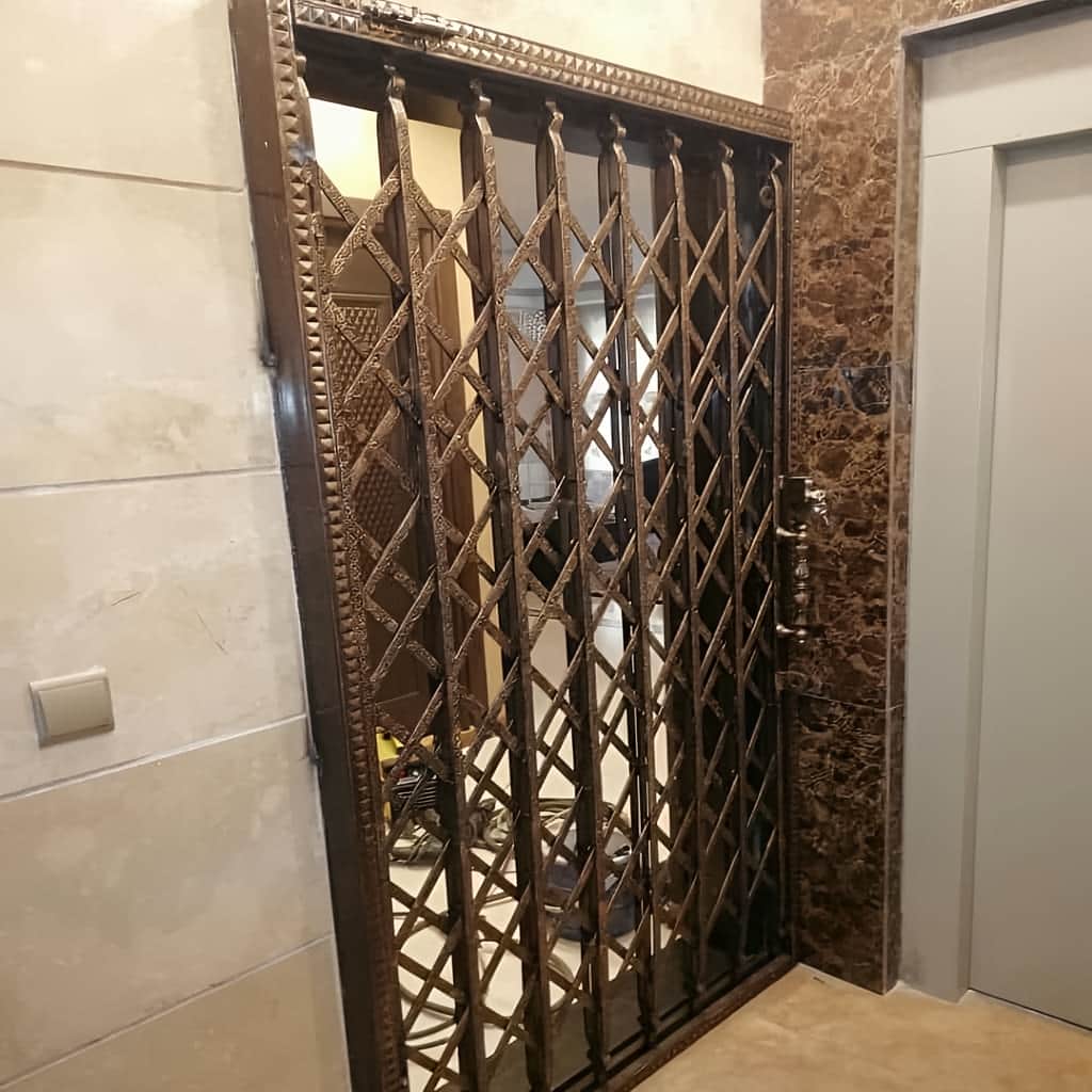 قیمت درب آکاردئونی طرح دار لوزی بر اساس متریال و اجرا