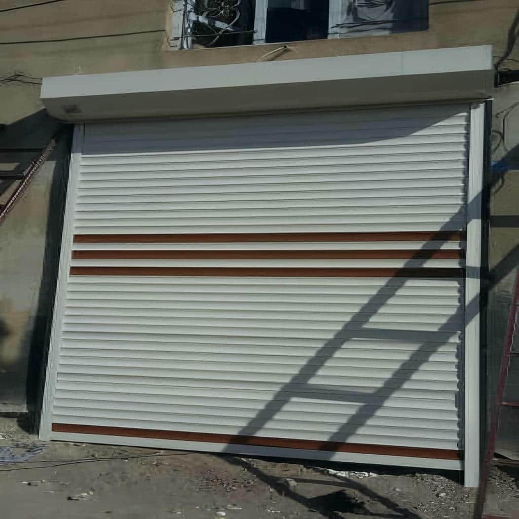 سفارش کرکره برقی آلومینیومی دو پل مناسب مغازه و پارکینگ