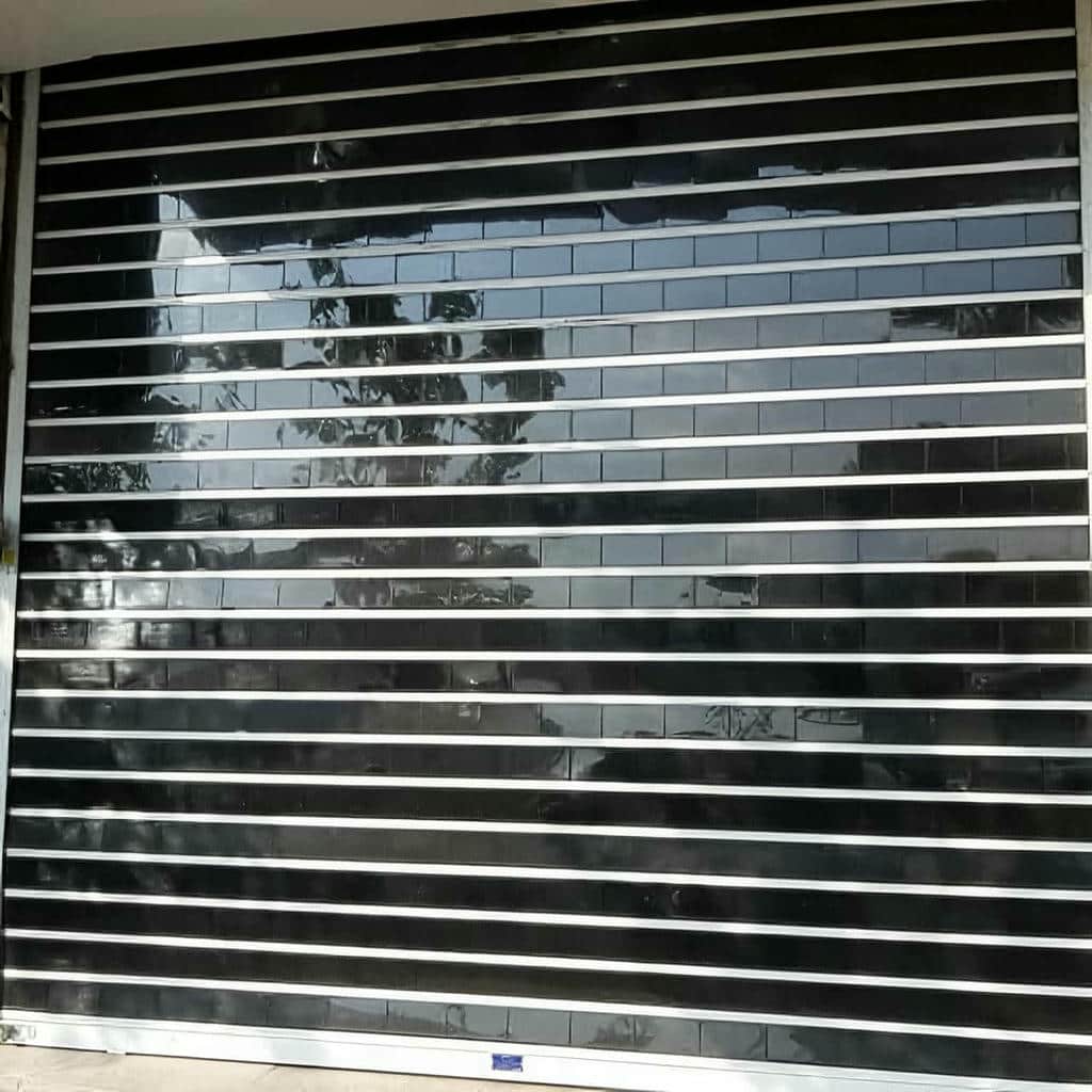 اجرای کرکره برقی پارکینگ موتور ساید برای ورودی عریض