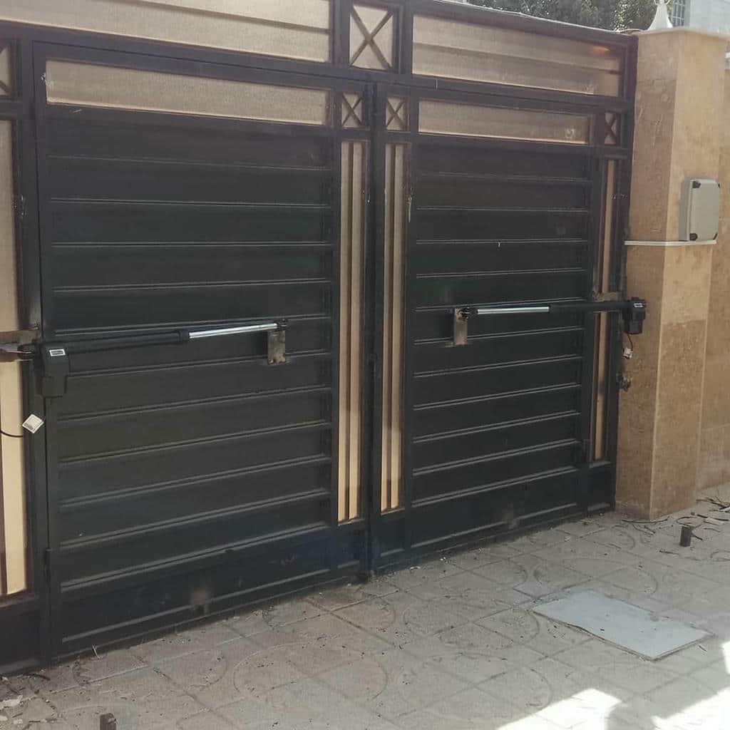 خدمات جک درب پارکینگ بی صدا کم تردد با چشمی ایمنی